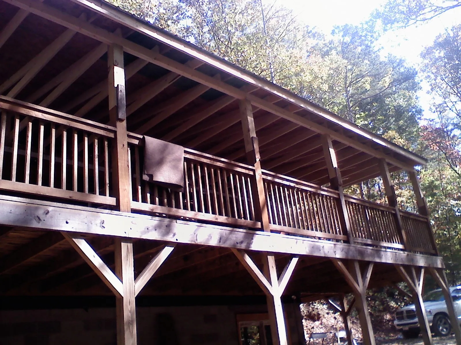 Timber framing under a new elevated porch and deck — Roof Leak Repair in Wading River by Roofing Brothers